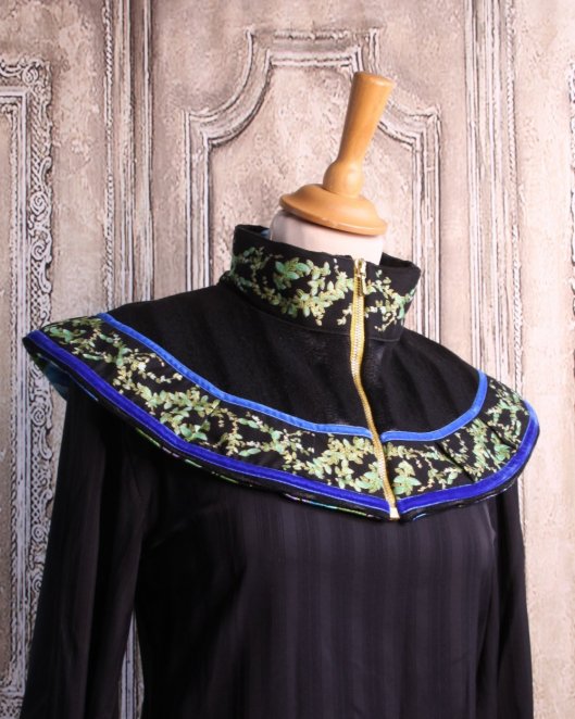 Col en laine noir et bleu vert